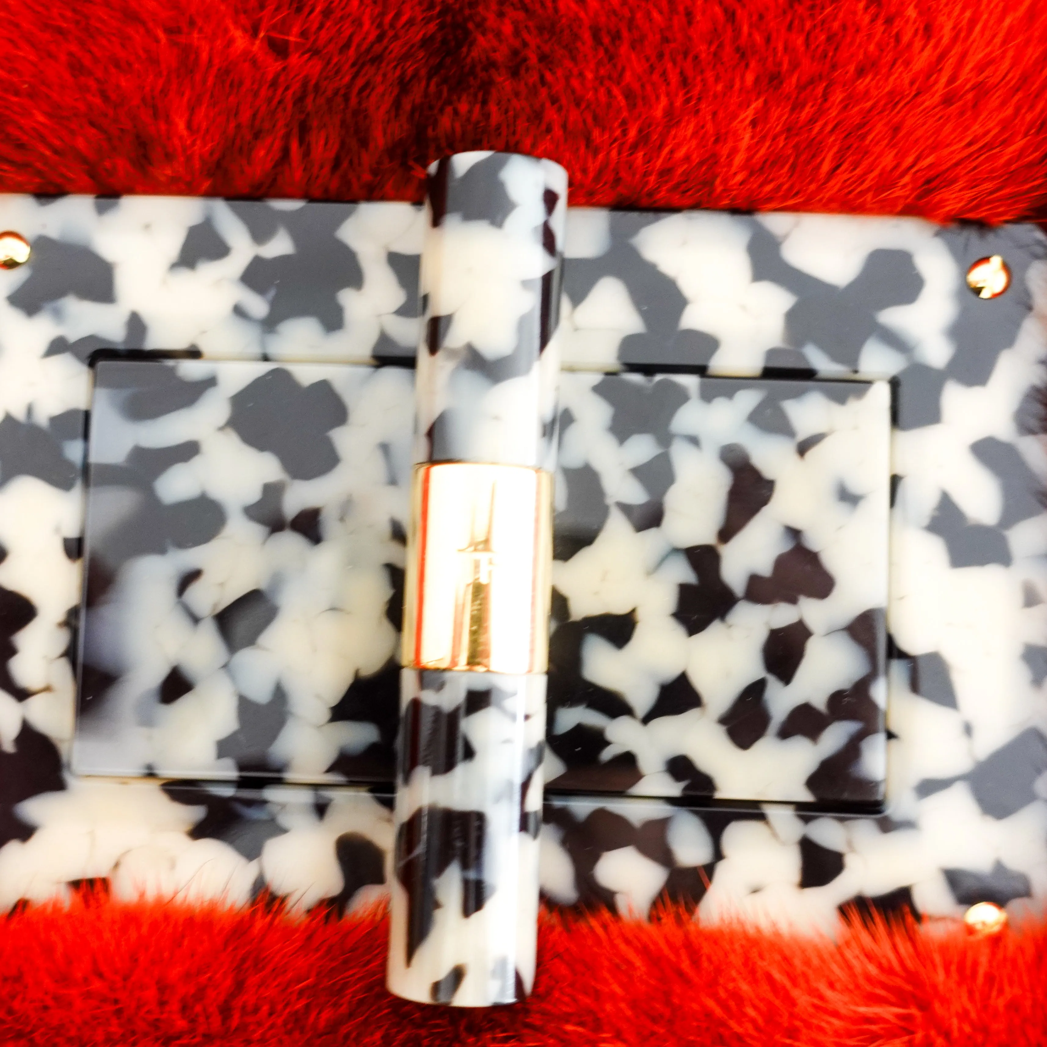 Orange mink clutch RRP £800