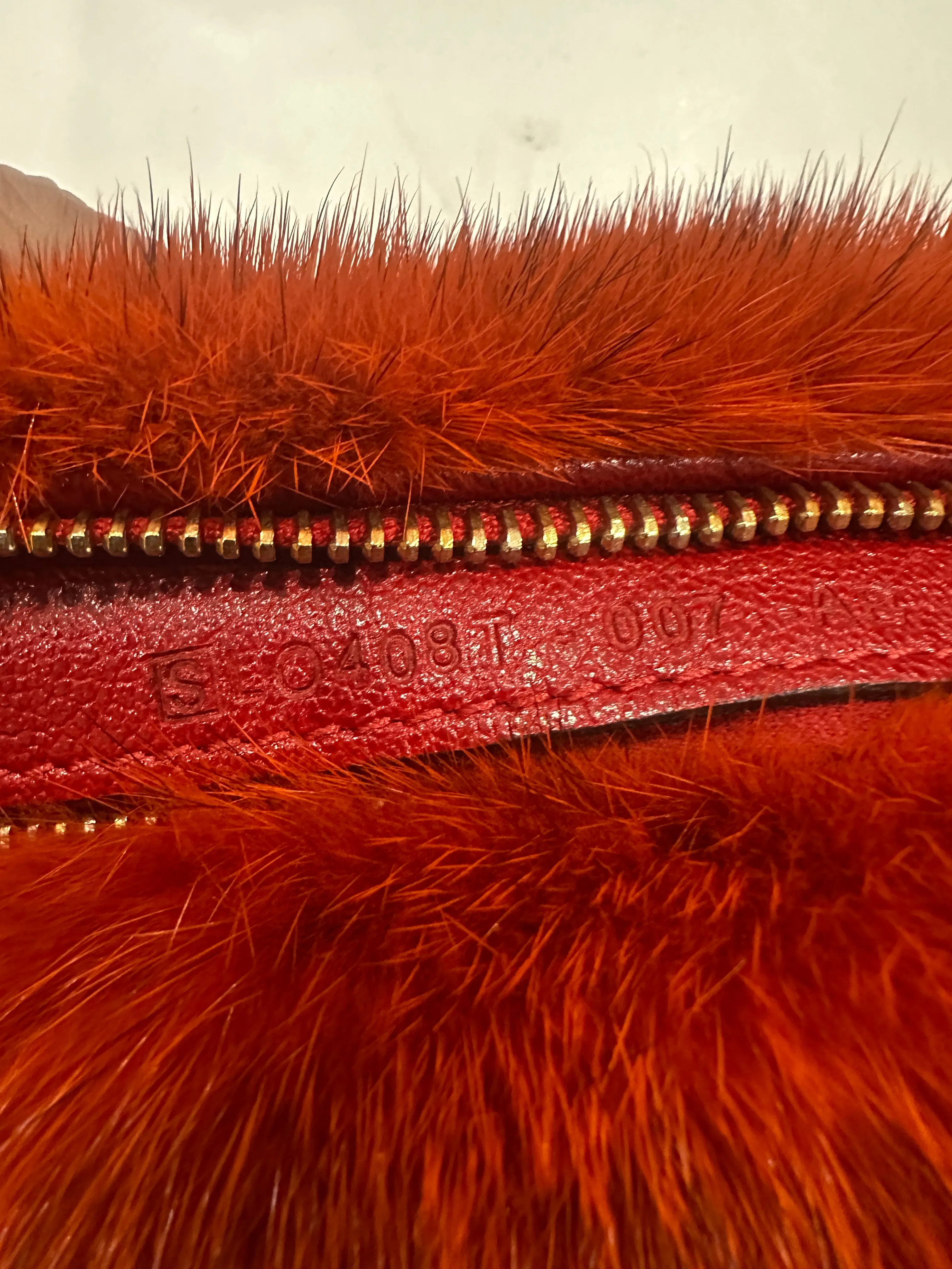 Orange mink clutch RRP £800